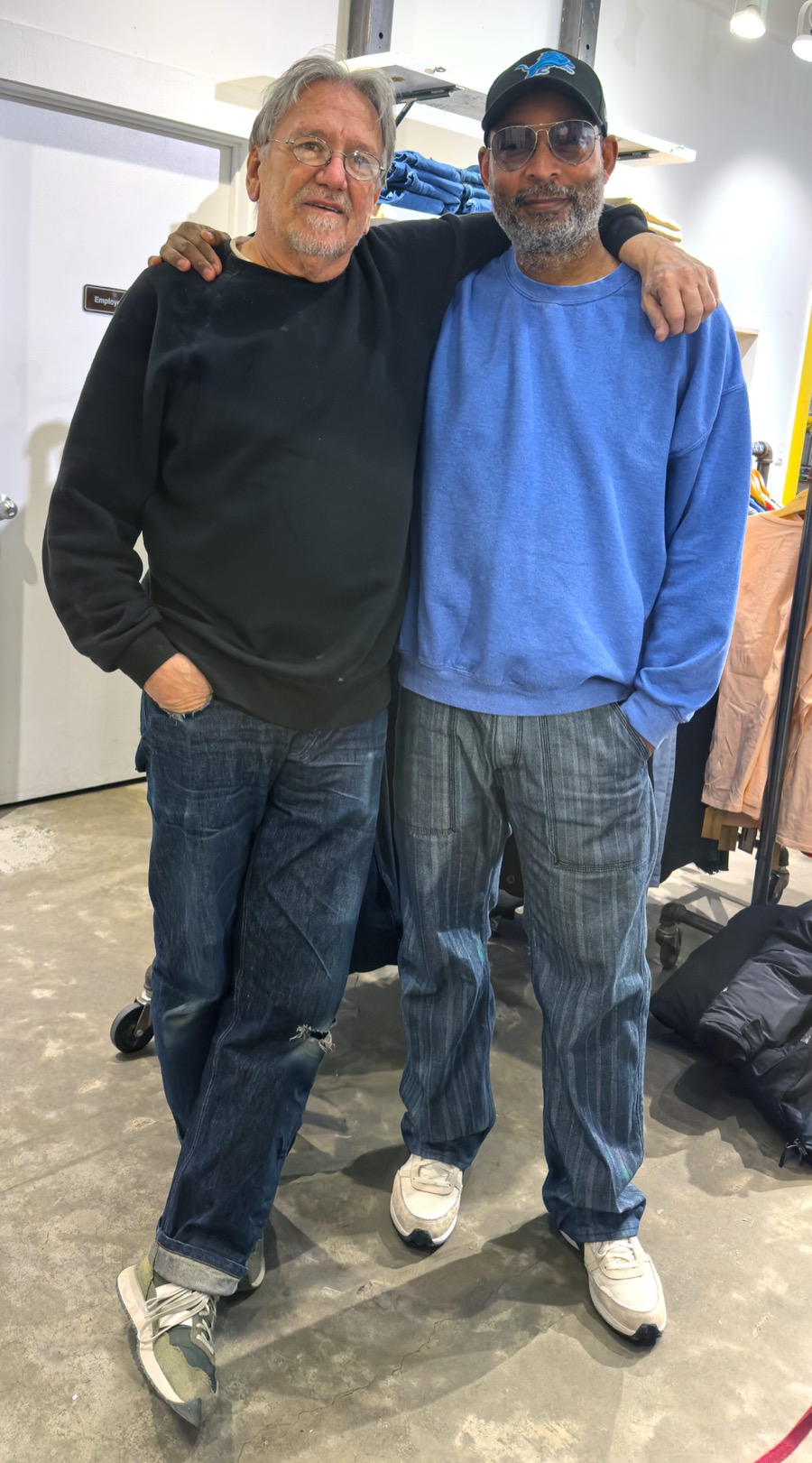 Maurice Malone with master tailor Frank Pizzurro in the Greenpoint workshop, both wearing Williamsburg Garment Company denim